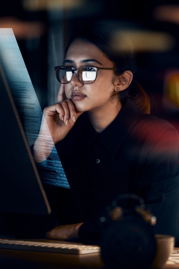 programming-cybersecurity-and-thinking-with-woman-at-computer-for-software-idea-and-coding-at-nig.jpg