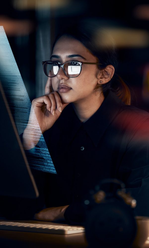 programming-cybersecurity-and-thinking-with-woman-at-computer-for-software-idea-and-coding-at-nig.jpg